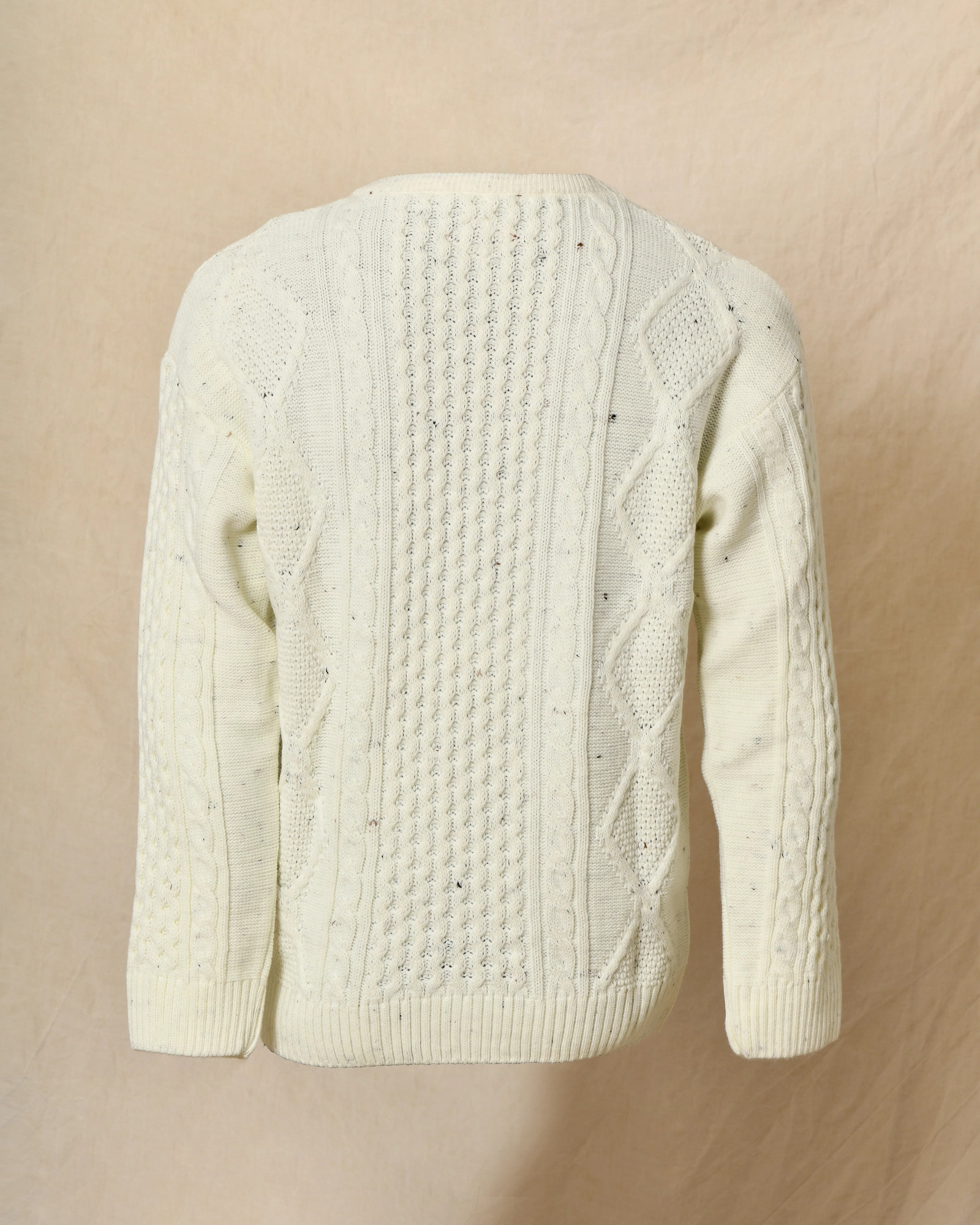 Pull en maille torsadée écru moucheté Telacruda