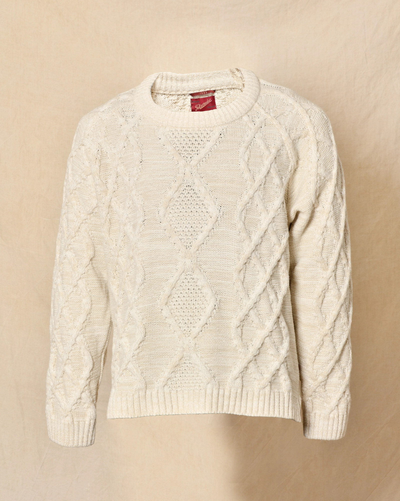 Pull en maille torsadée blanc cassé Telacruda